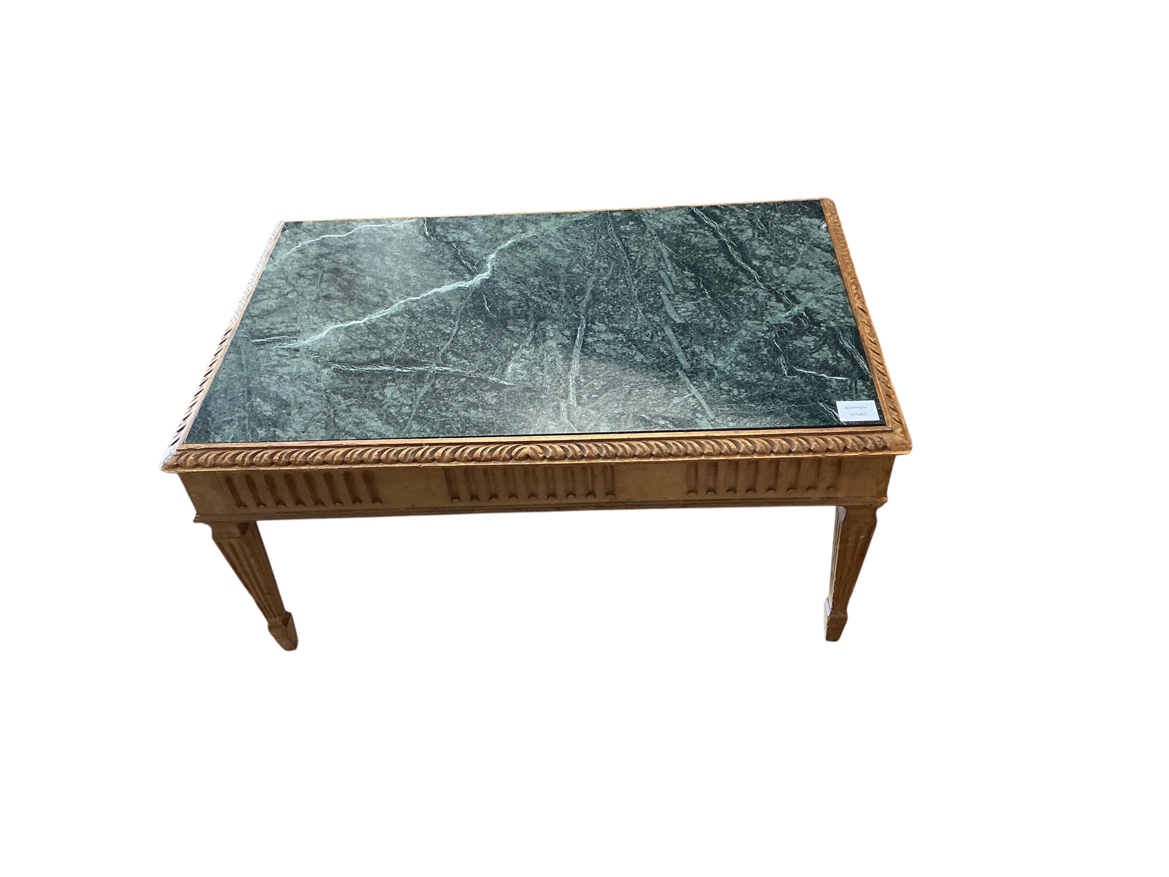 A rectangular marble top pine coffee table, width 81cm, depth 51cm, height 41cm